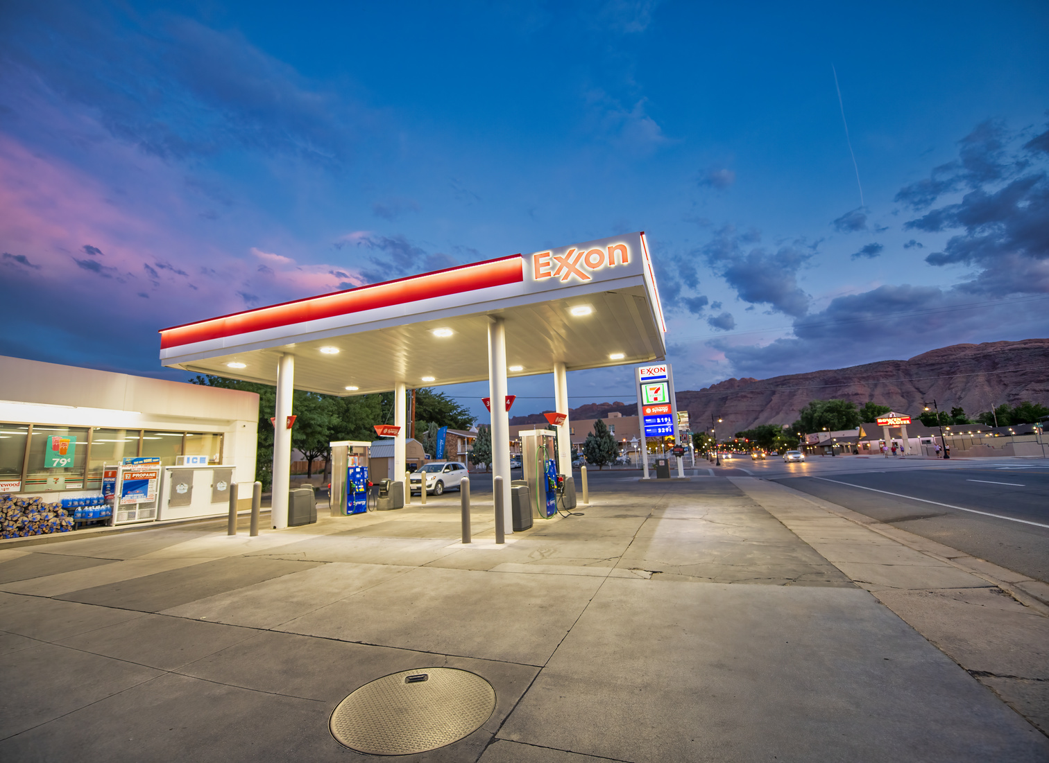 Moab, Utah - June 30, 2019: Exxon Gas Station at Night with Red